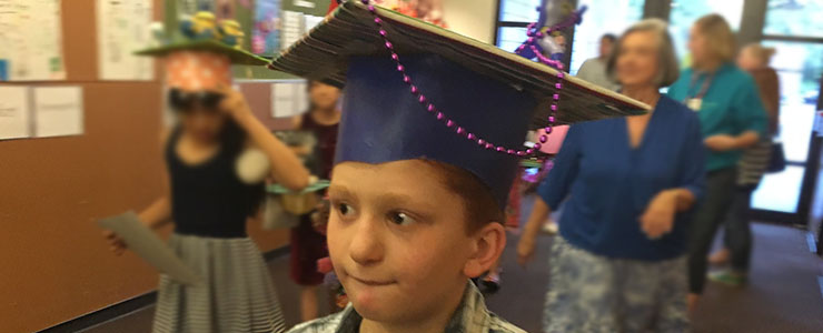 boy graduating elementary school