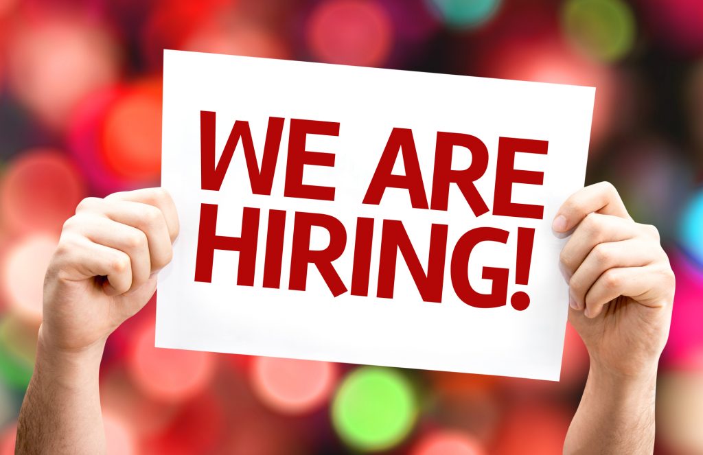We are Hiring card with colorful background.