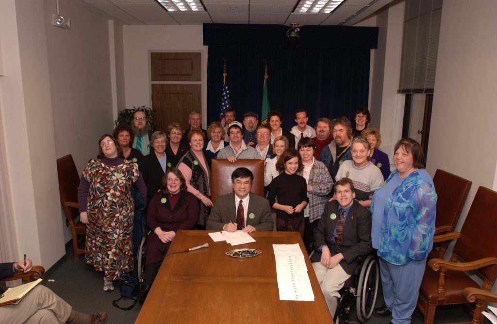 Bill signing photo of HB 2663, Respecful Language Act, with Governor Gary Locke.