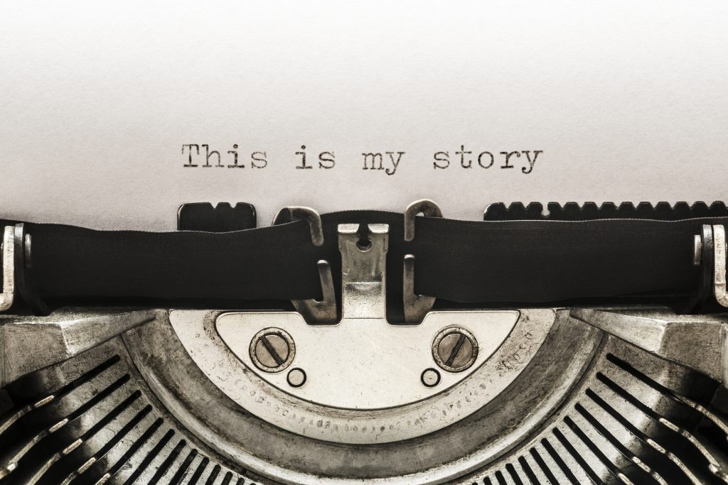 "This is my story" typed on a vintage typewriter.