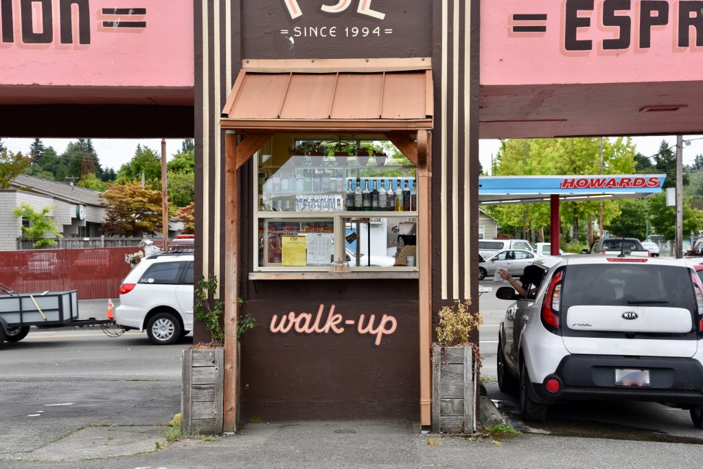 Walk up window at a drive thru espresso stand.