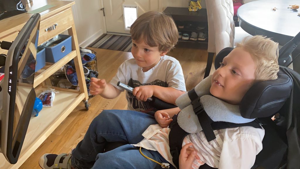 Jack and Charlie at home, playing game.