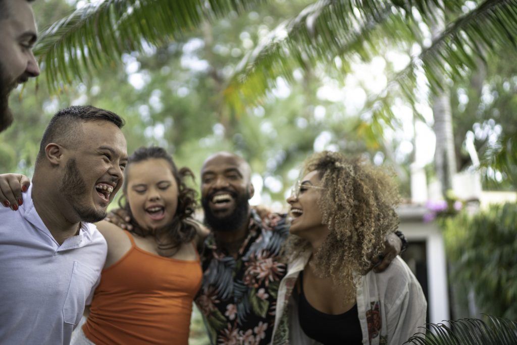 Family embracing and singing together.